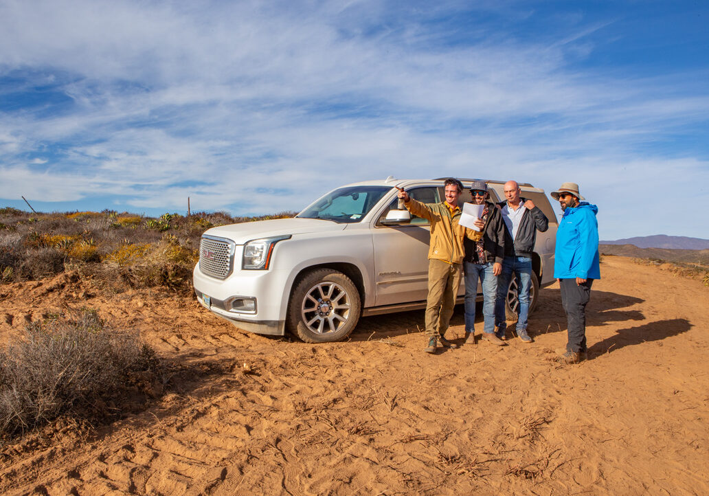 friends at car in nature